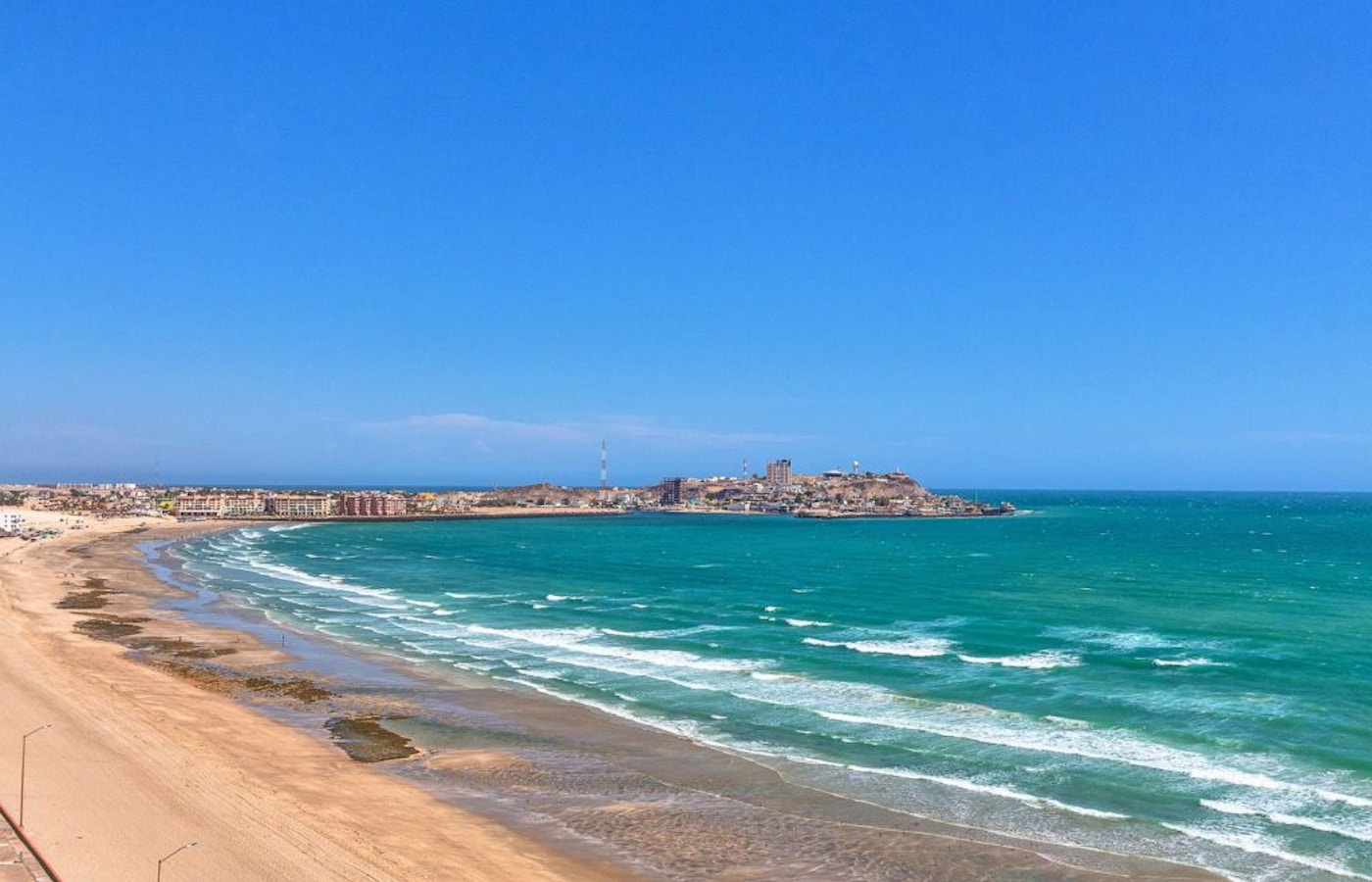 Wide view of Sandy Beach and the Rocky Point coastline