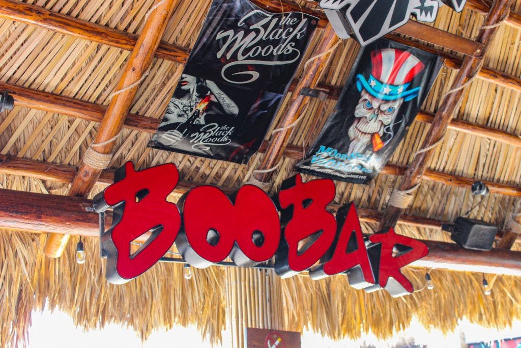Boo Bar sign beneath its palapa roof in the Rocky Point Malecón