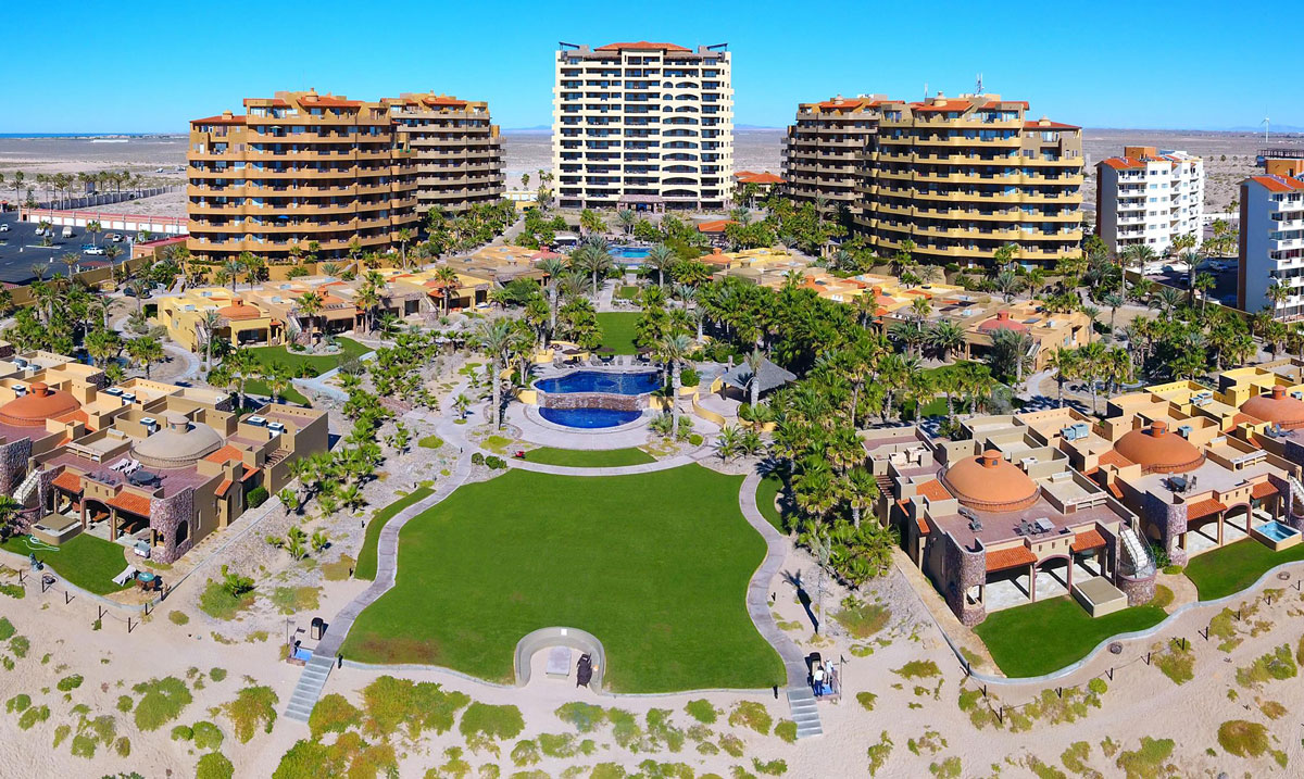 Aerial view of Bella Sirena Resort on Sandy Beach