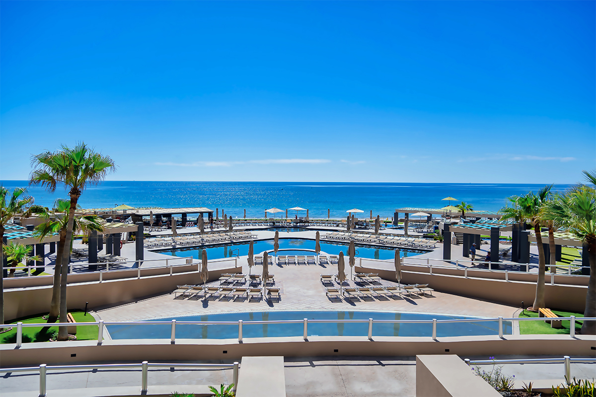 Beachfront pool deck at Las Palomas