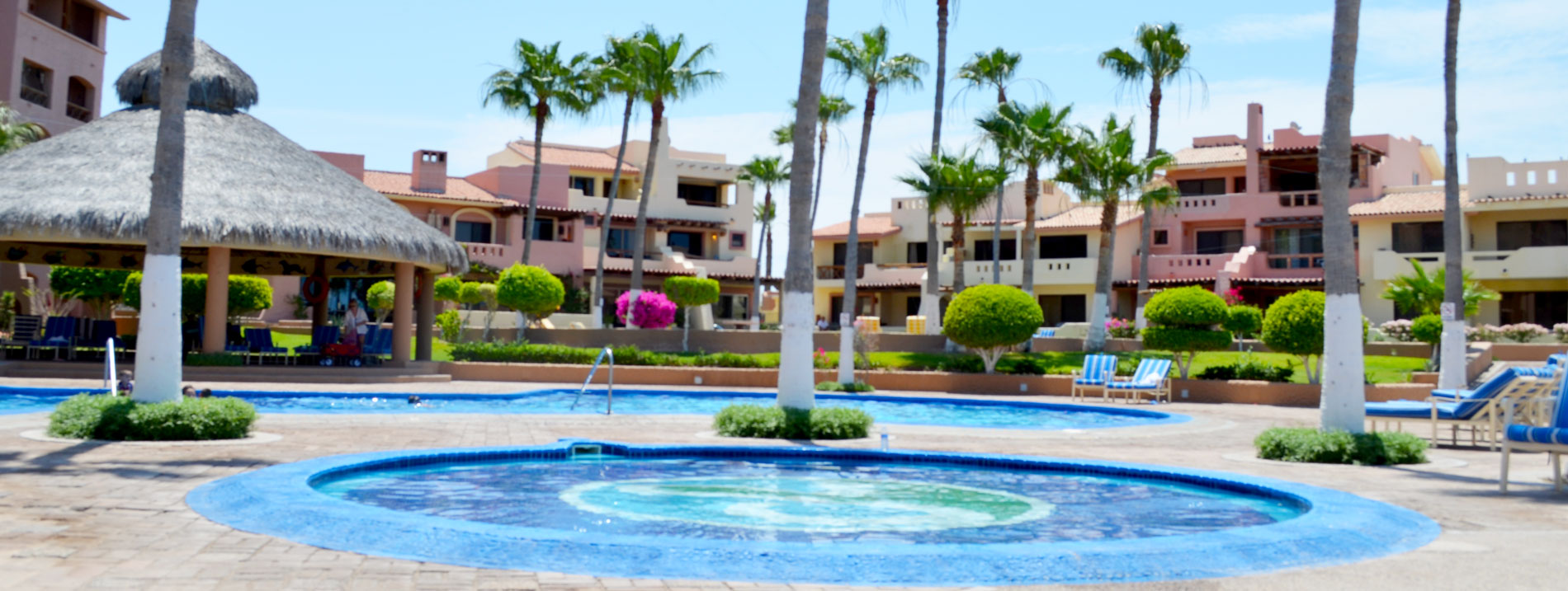 Pools, palapa, palms, and villas at Marina Pinacate Rocky Point