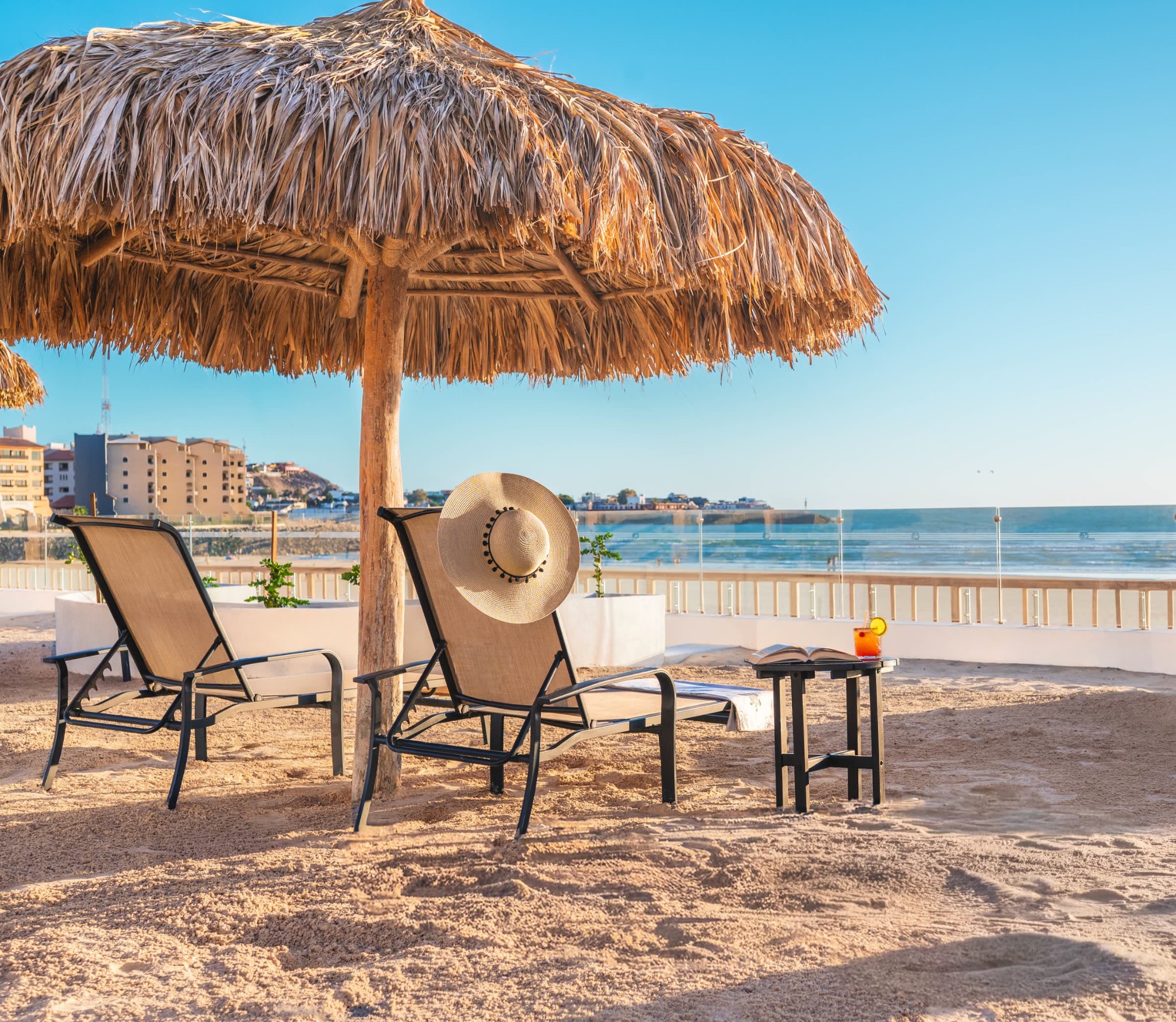 Beach palapas and lounge chairs at Sonoran Star