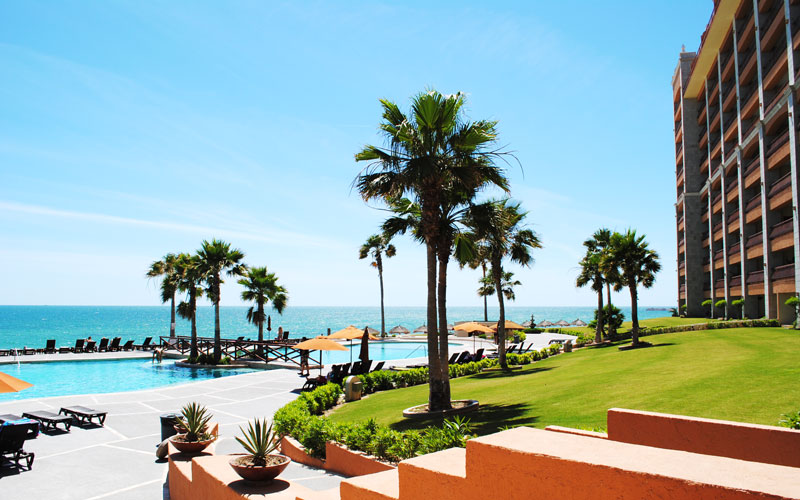 West building, lawns, and beach